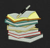 Stack of Books with a Pen Embroidery Design
